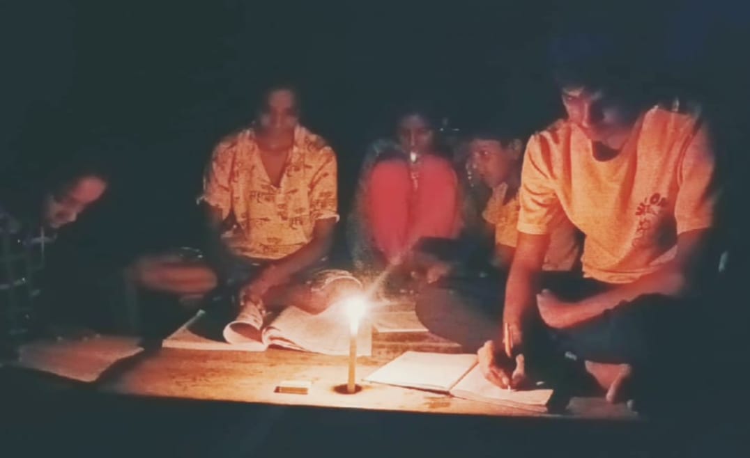 Students forced to study by candlelight due to unannounced power cuts